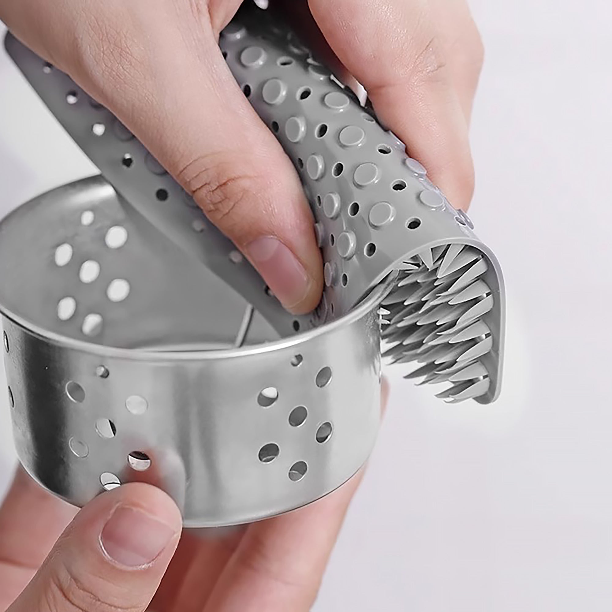 Brosse multifonctionnelle Tidy.