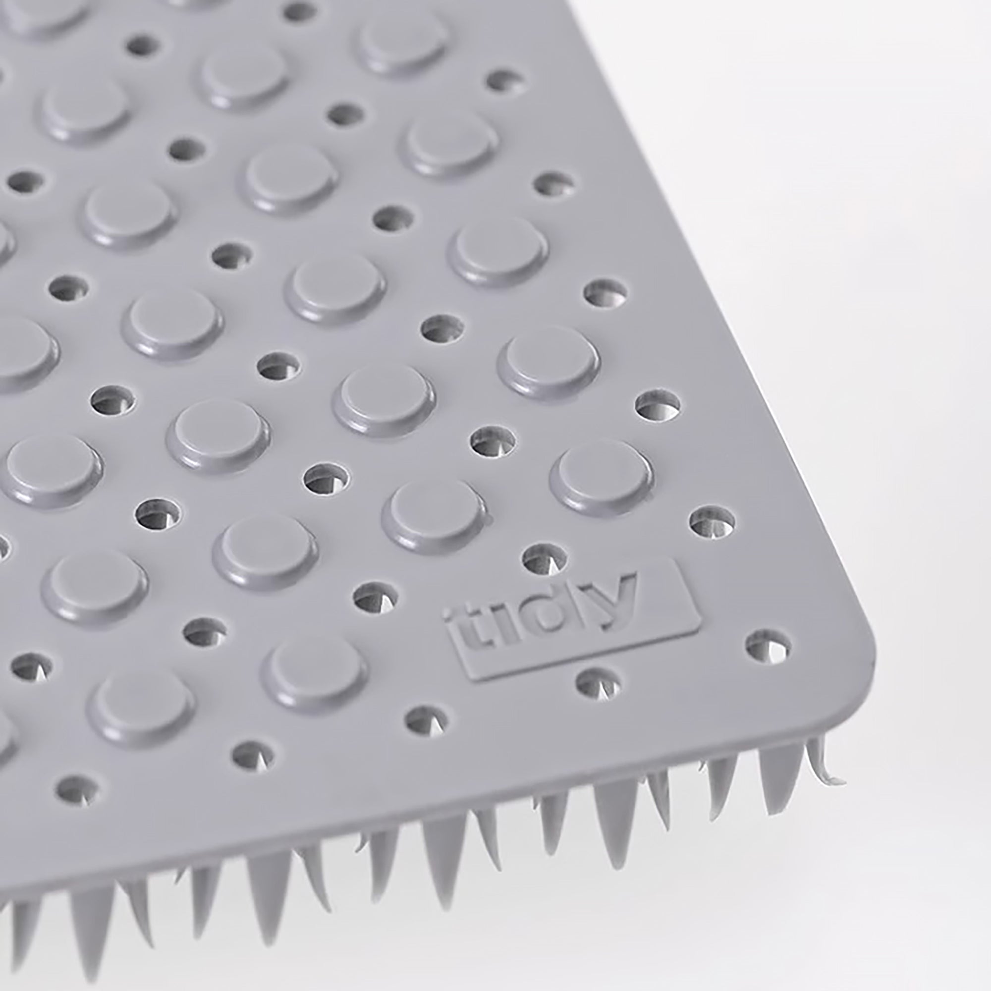 Brosse multifonctionnelle Tidy.