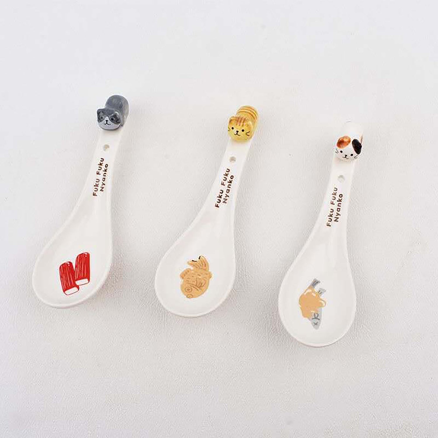 Porcelain Kitten Spoon with Embossed Handle