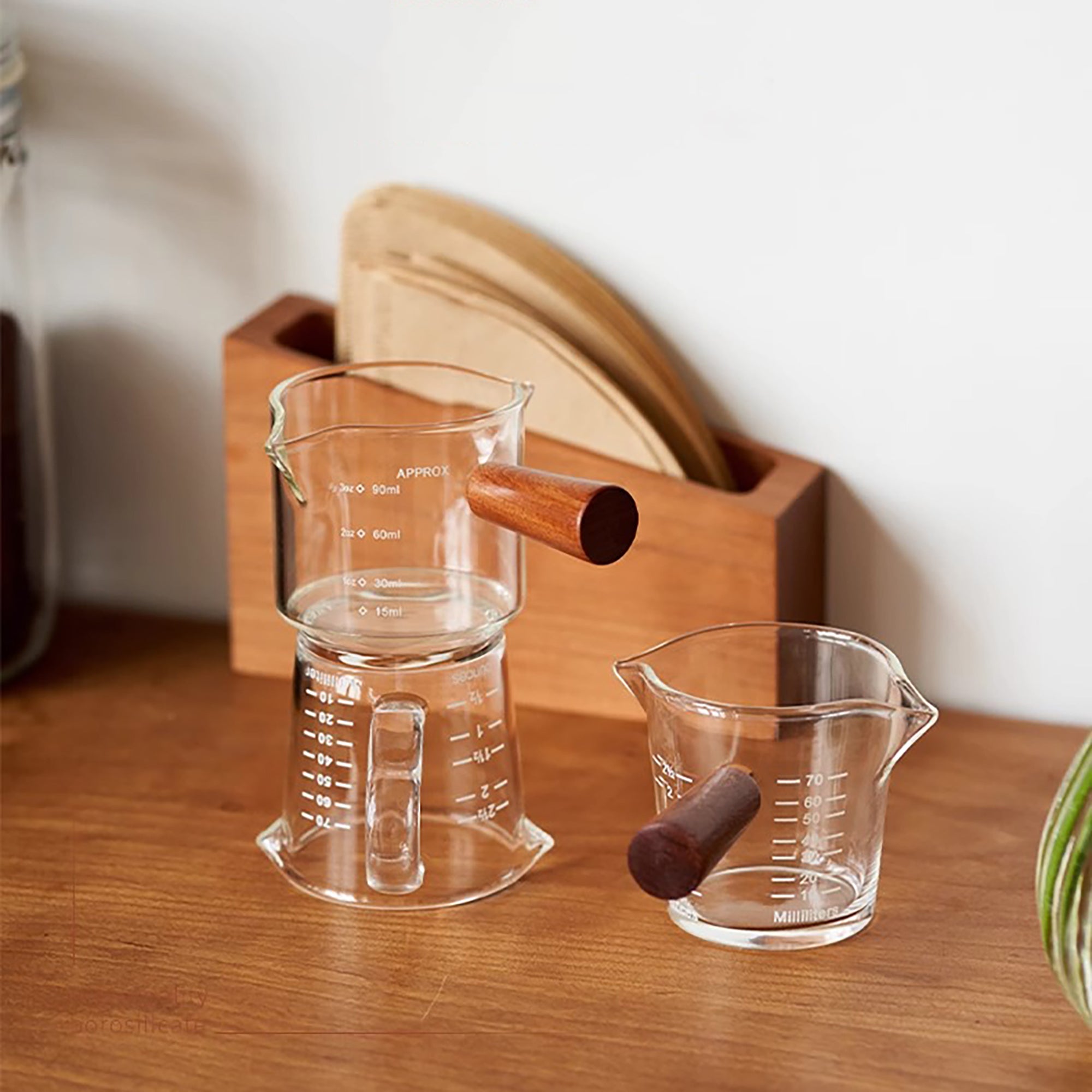 Verre doseur en borosilicate avec double bec verseur