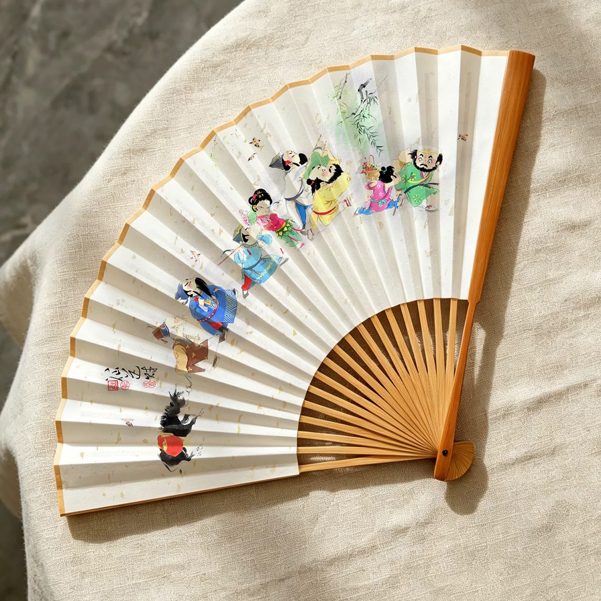 Éventail pliant artisanal chinois en papier Xuan et bambou d’Anji