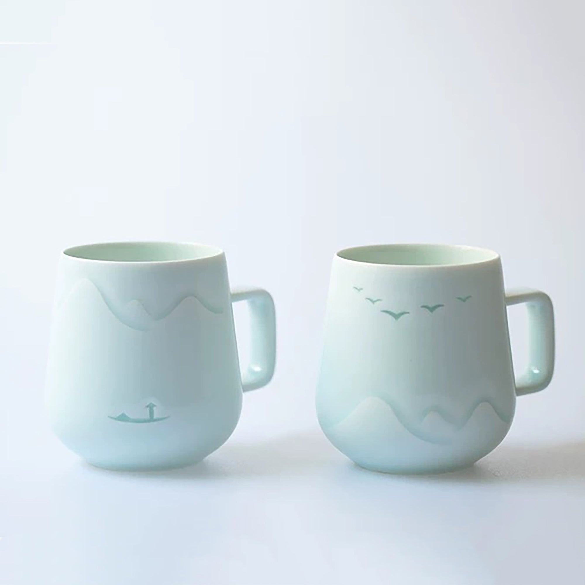 Mug en porcelaine style translucide avec motif oiseaux et pêcheur