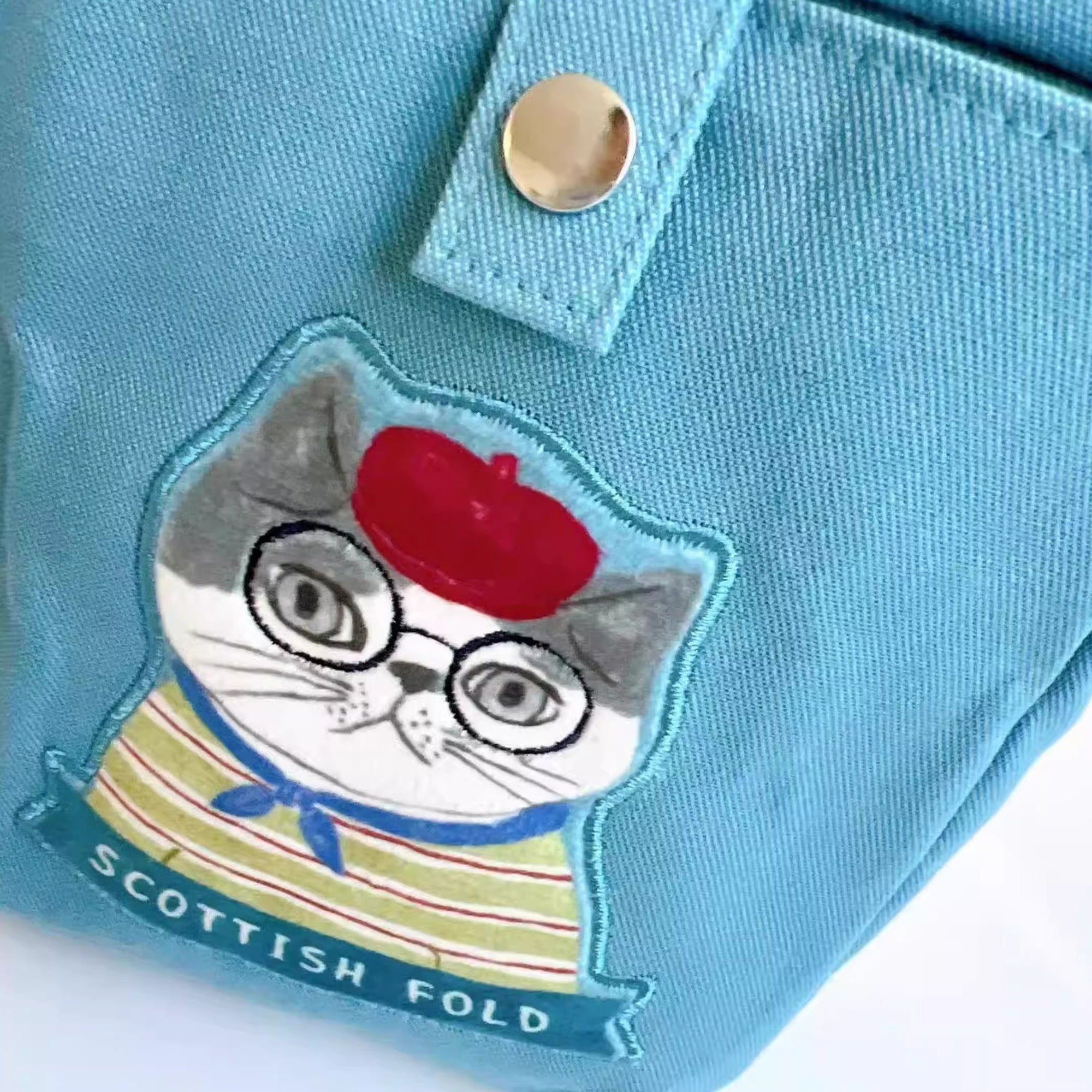 Sac bandoulière compact Kusuguru avec chat brodé