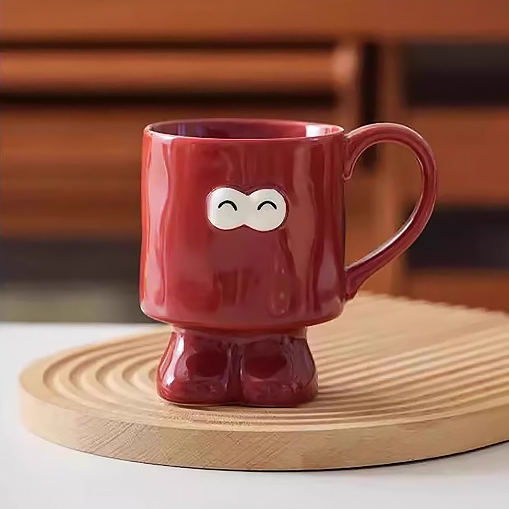 Mug en céramique sur pied motif emoji yeux ronds