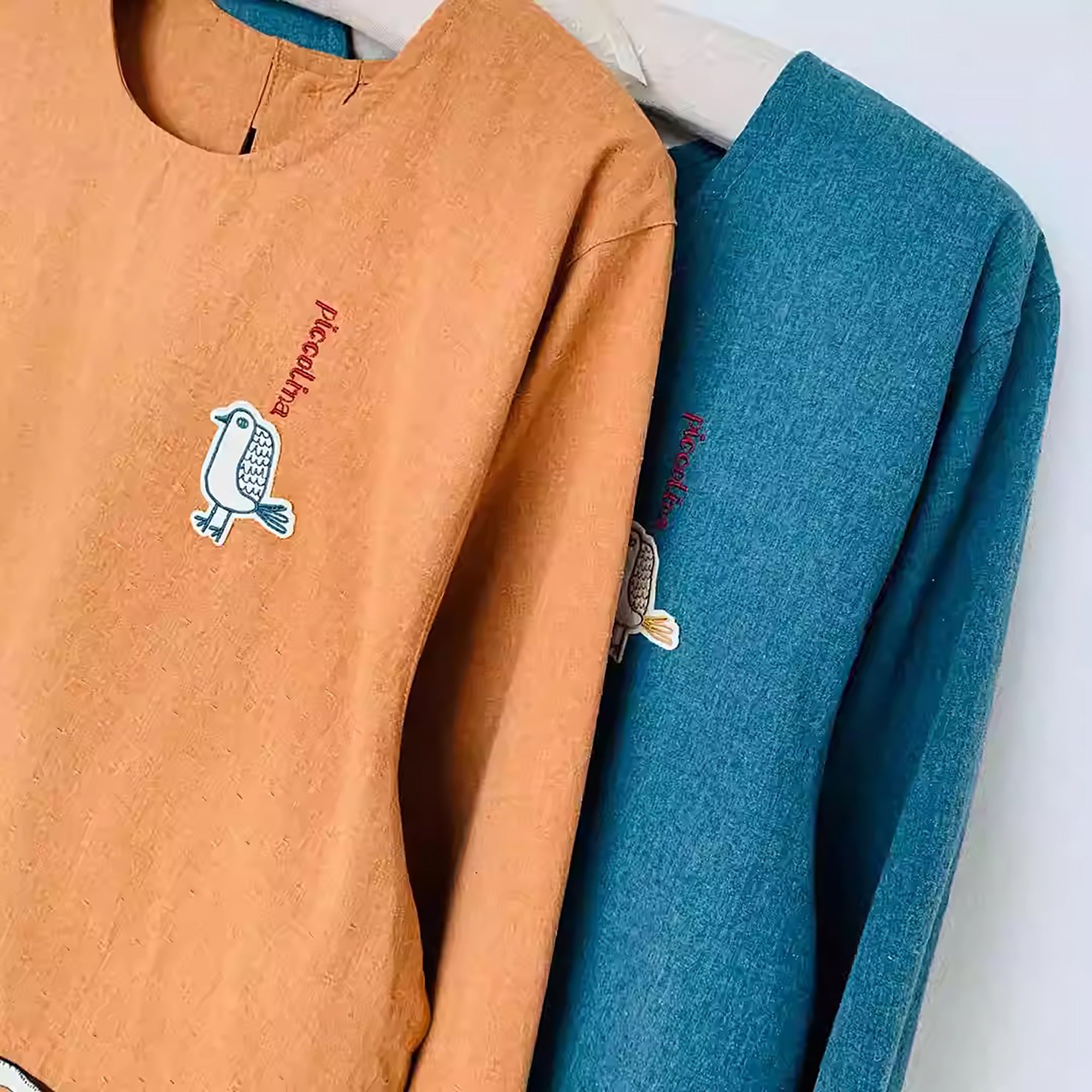 Tablier Kusuguru long à manches avec motif chat