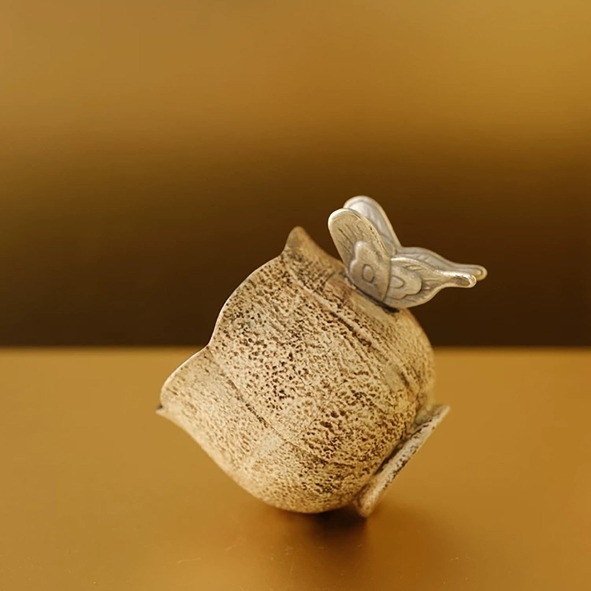 Tasse à thé motif pierre avec anse papillon