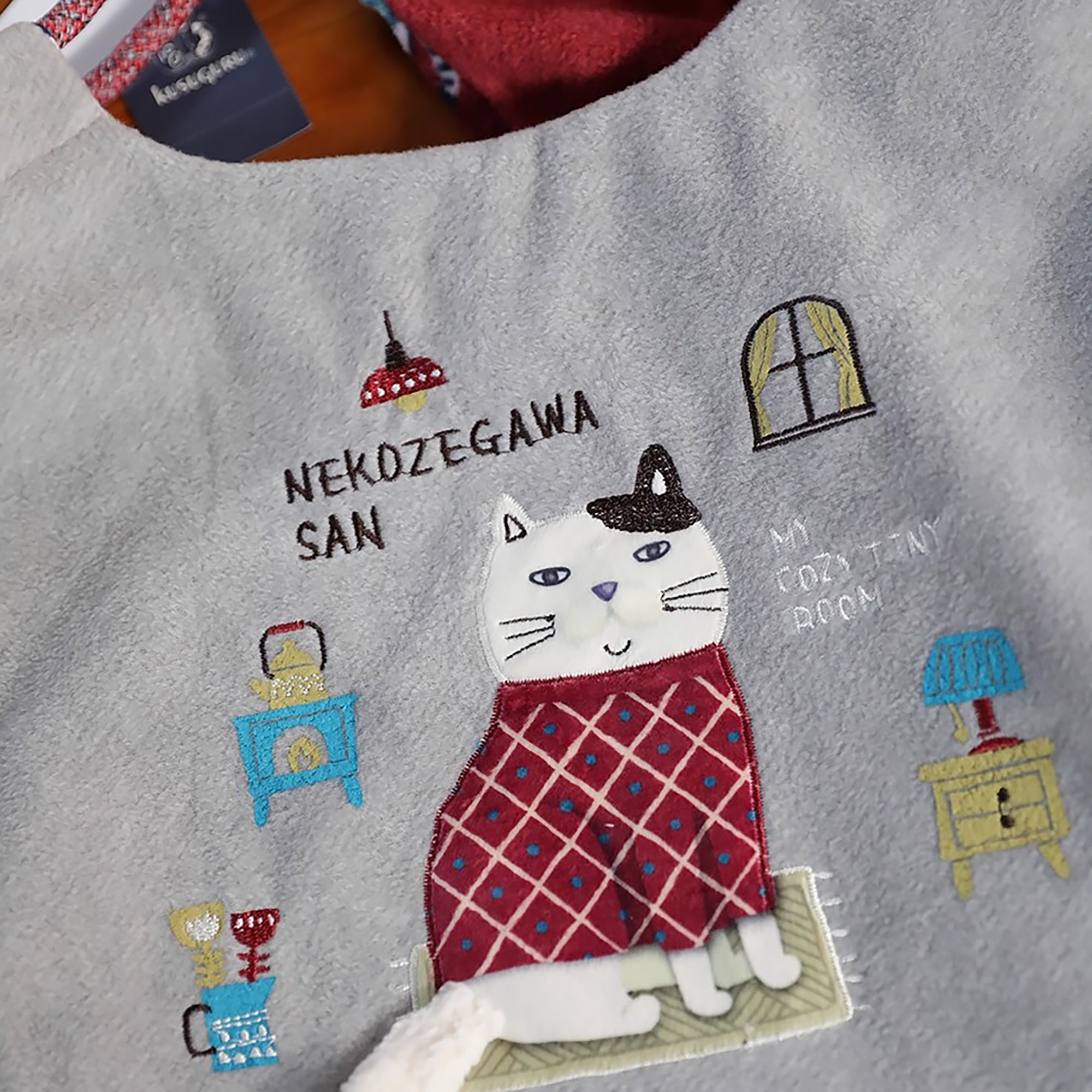 Sac de cours Kusuguru en tissu polaire avec broderie