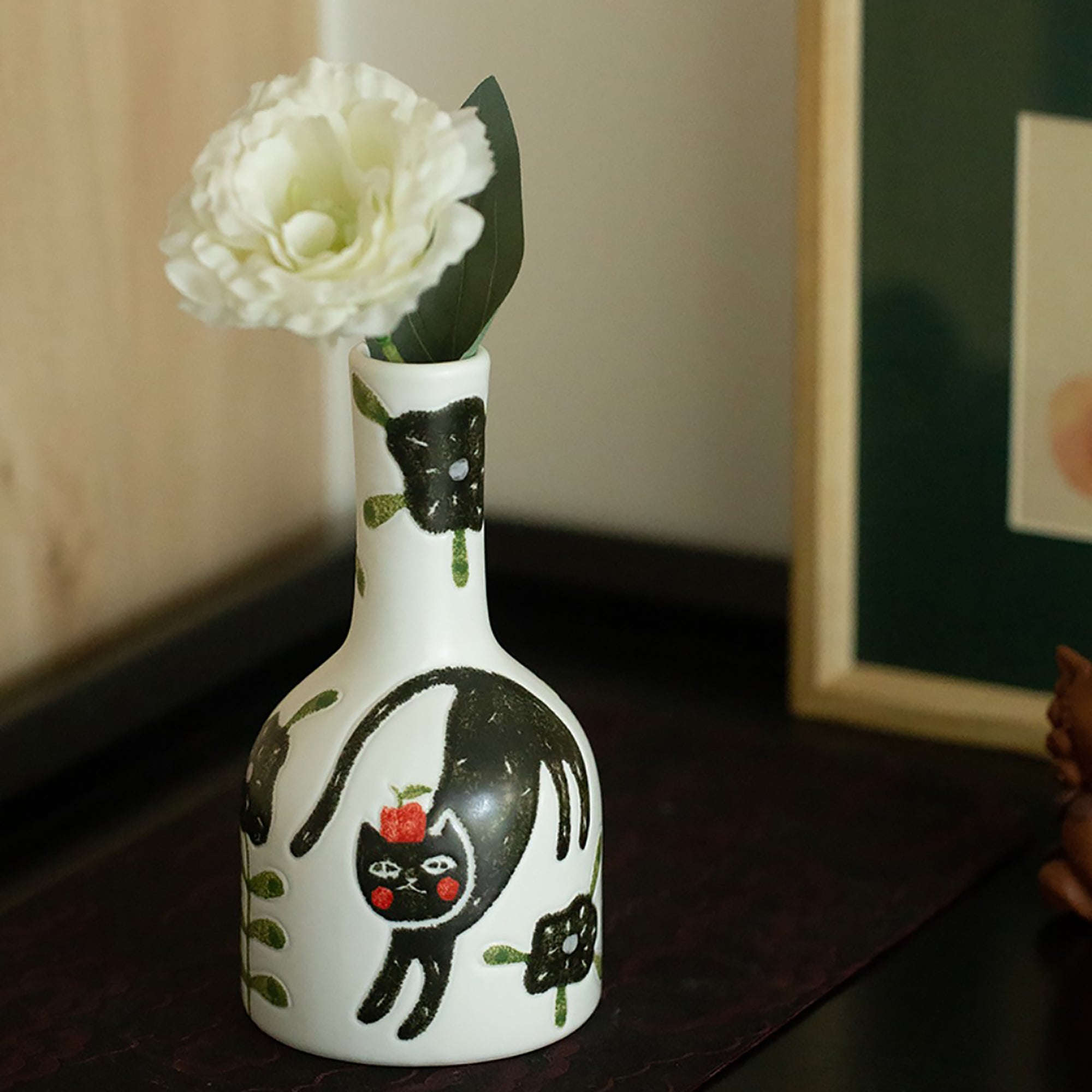 Vase en céramique avec motif chat noir
