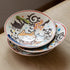 Assiette creuse en porcelaine Arita avec motif Chatons sous les cerisiers