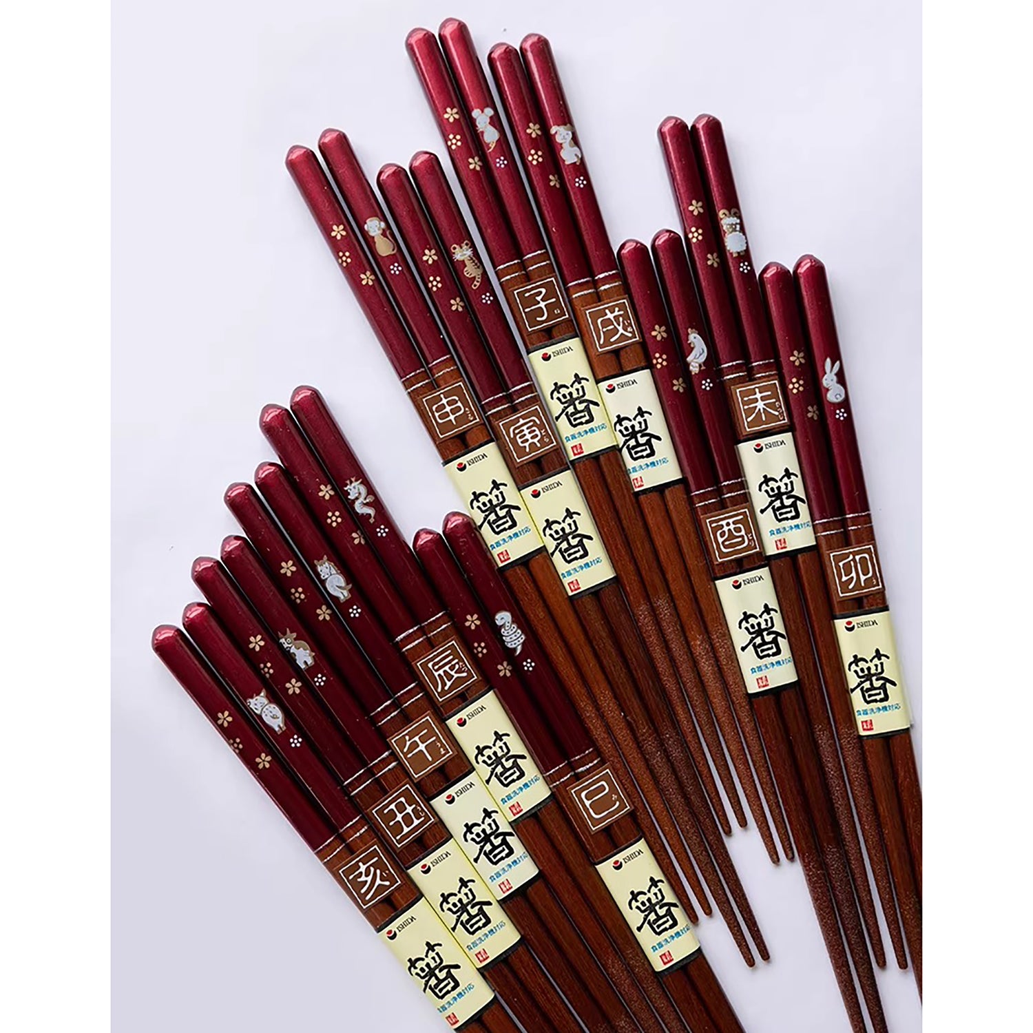 Baguettes japonaises en bois naturel rouge nacré motif zodiac