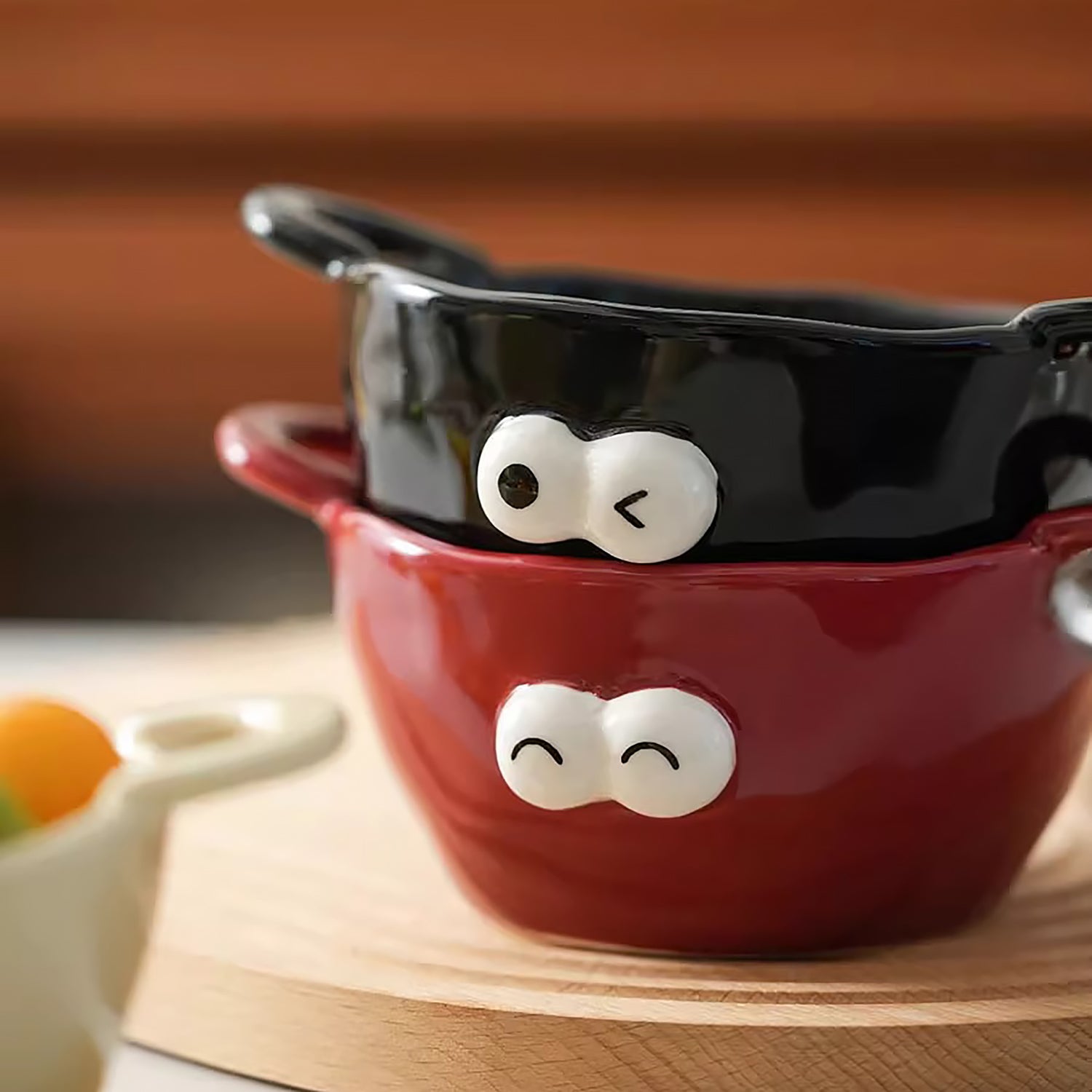 Bol en céramique à deux anses motif emoji yeux ronds