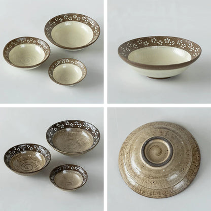Bol artisanal en céramique style Wabi-Sabi avec Petites fleurs blanches