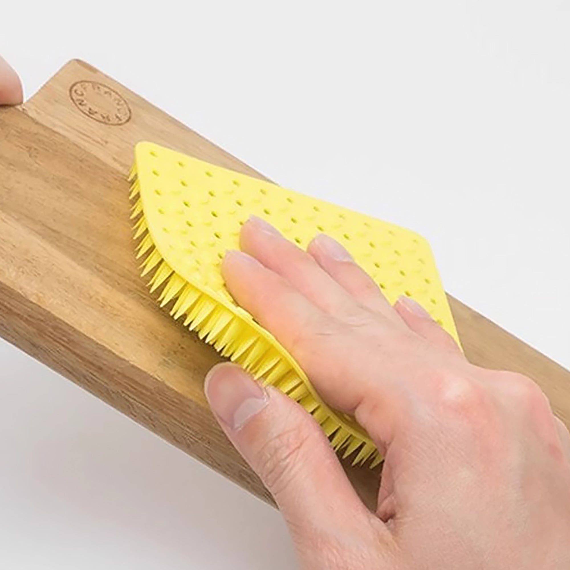 Brosse multifonctionnelle Tidy.