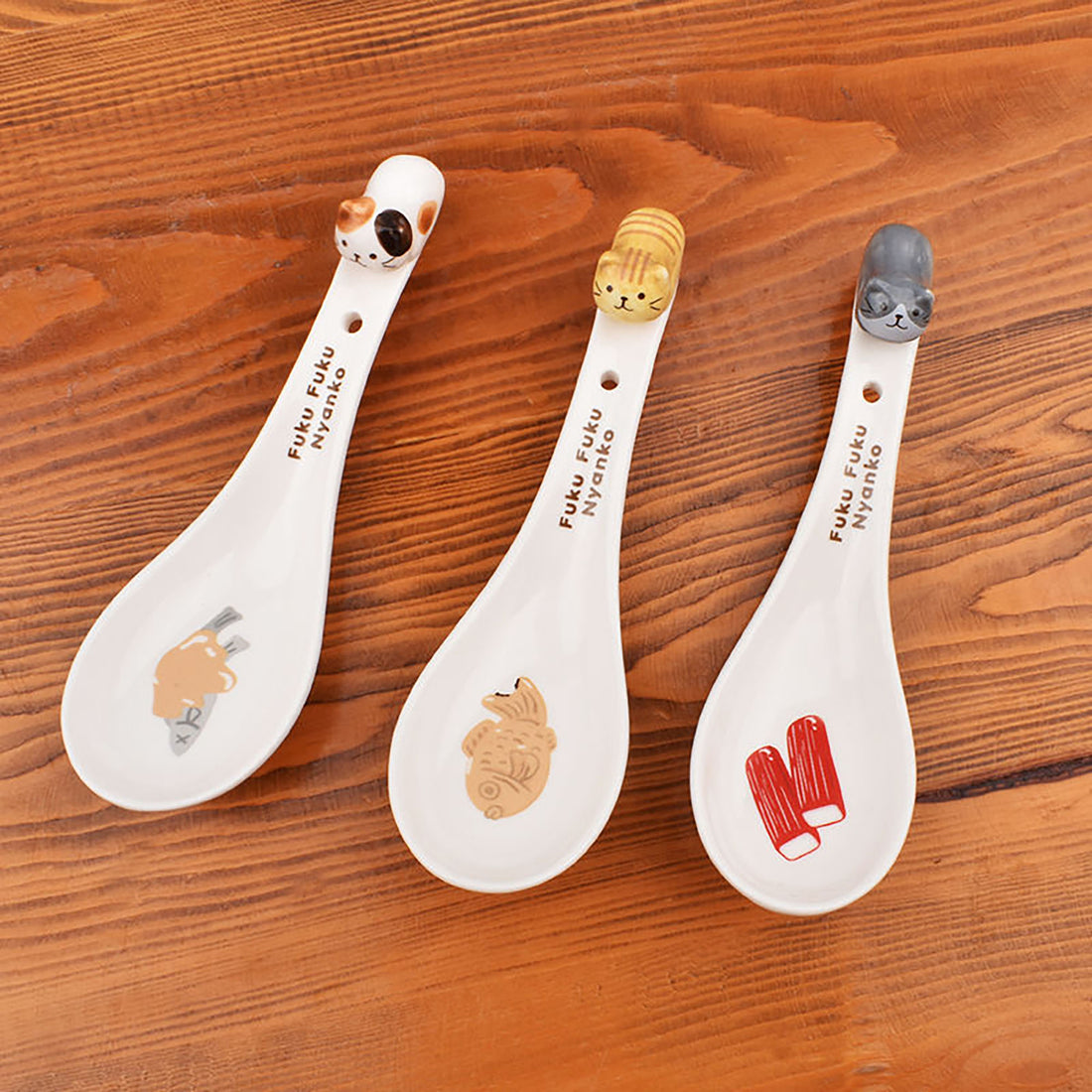 Porcelain Kitten Spoon with Embossed Handle
