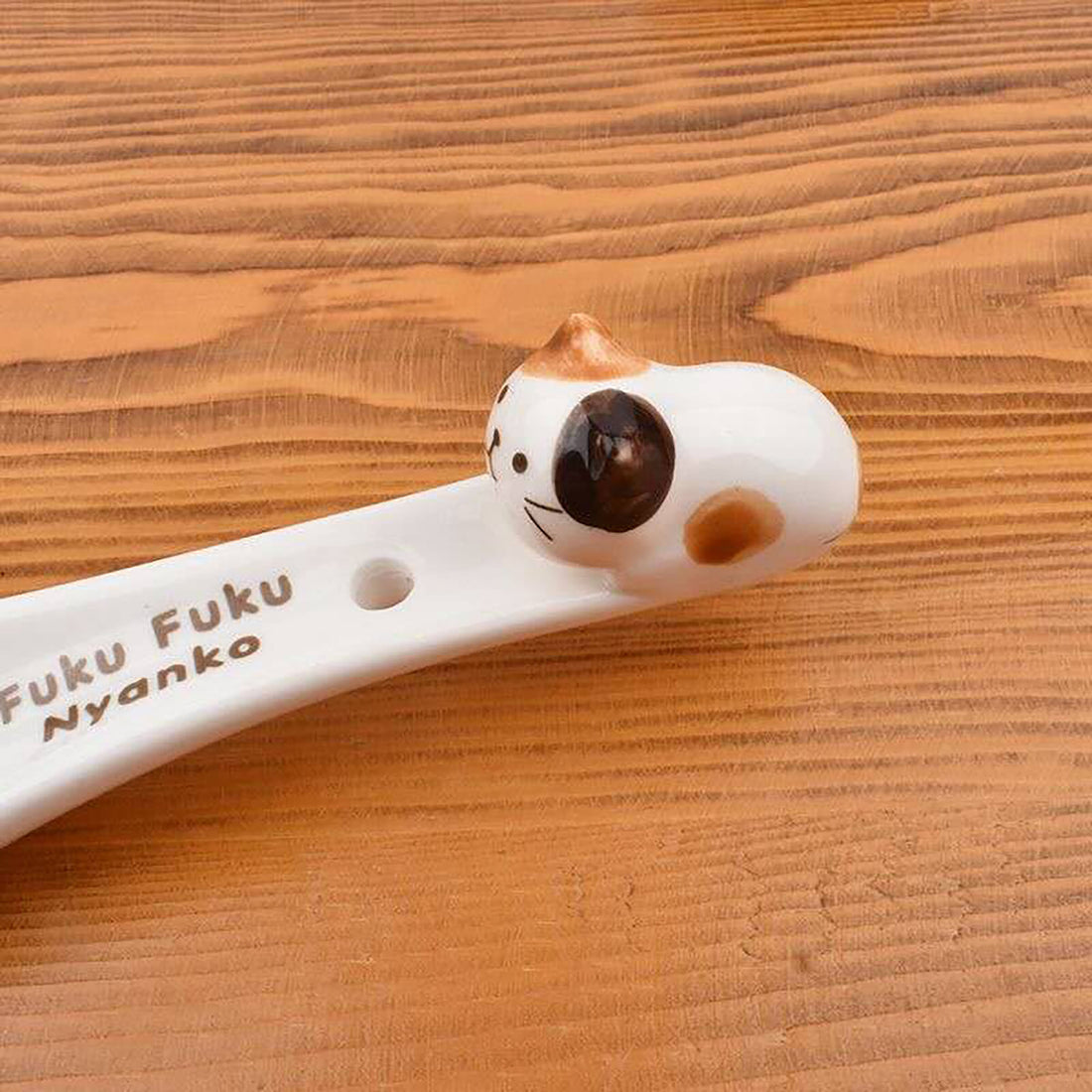 Porcelain Kitten Spoon with Embossed Handle