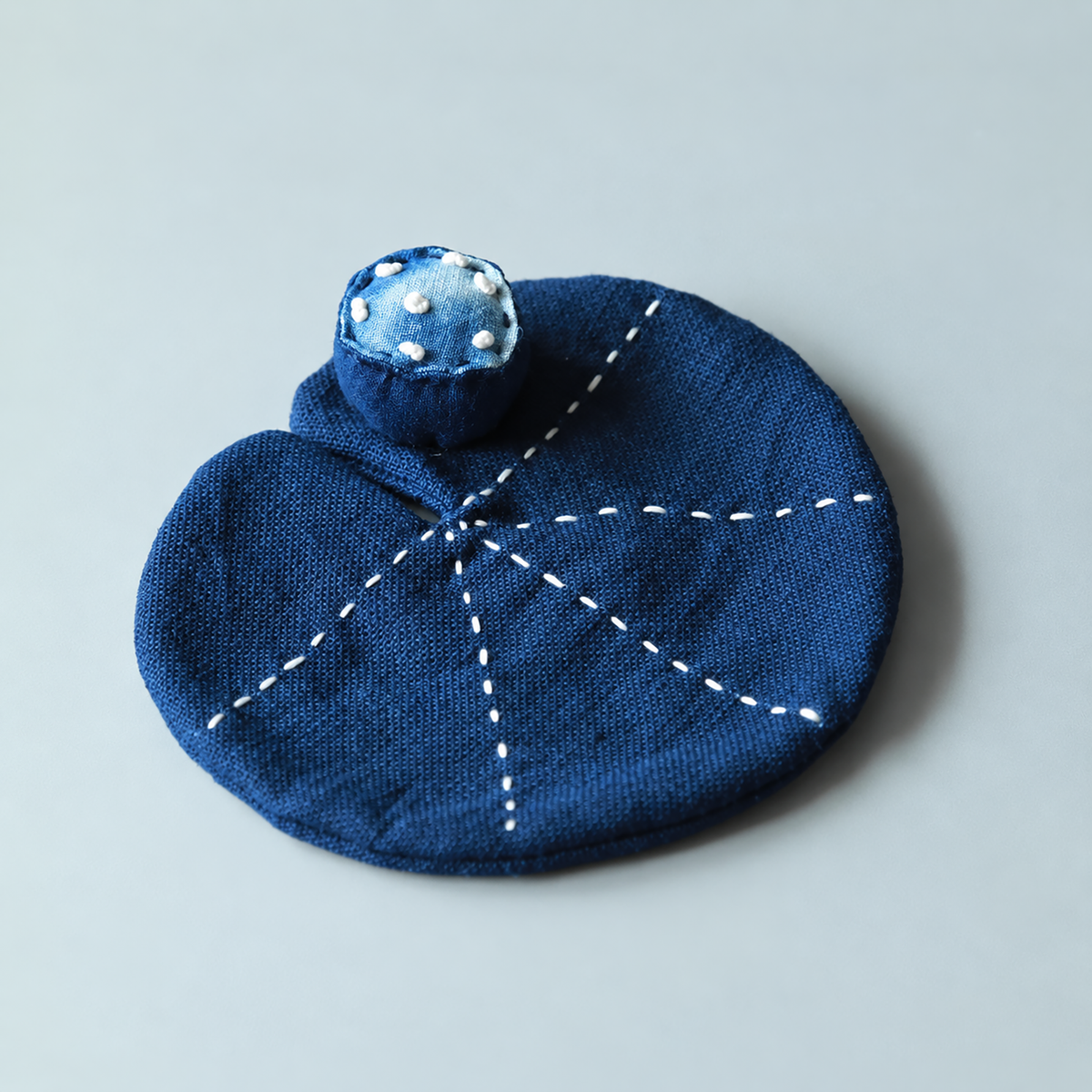 Dessous de tasse en coton indigo naturel avec motif feuille de lotus