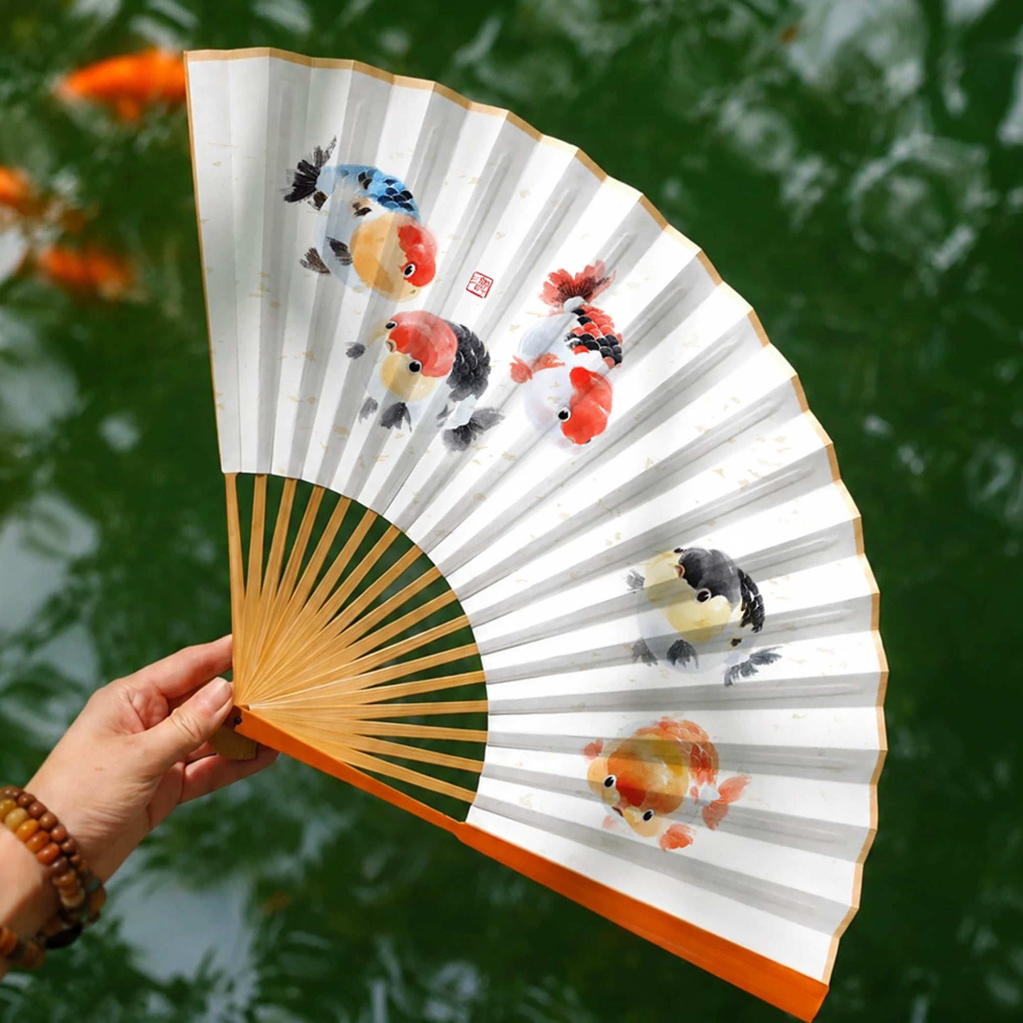 Éventail pliant artisanal chinois en papier Xuan et bambou d’Anji