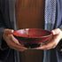 Grand bol japonais en céramique rouge profond