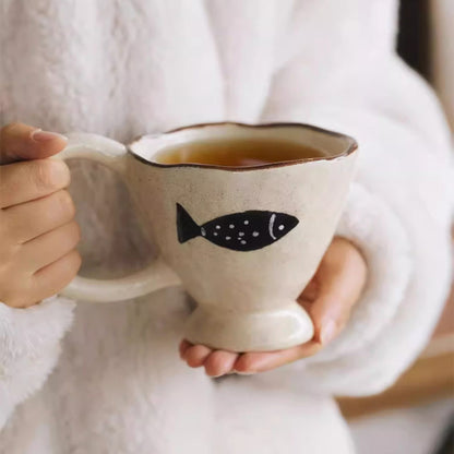 Tasse à café artisanale avec motif poisson