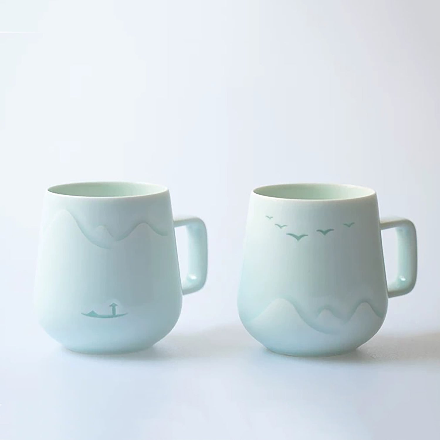 Mug en porcelaine style translucide avec motif oiseaux et pêcheur