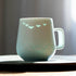 Mug en porcelaine style translucide avec motif oiseaux et pêcheur