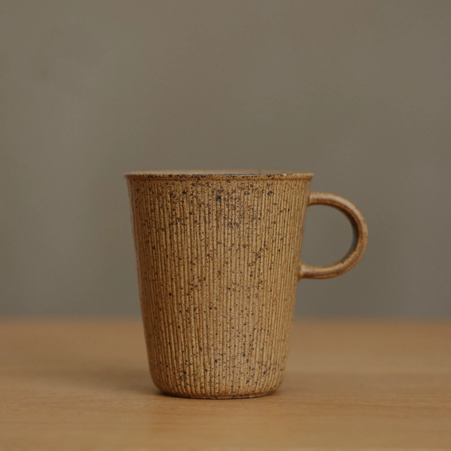 Mug en céramique à glaçure changeante effet four