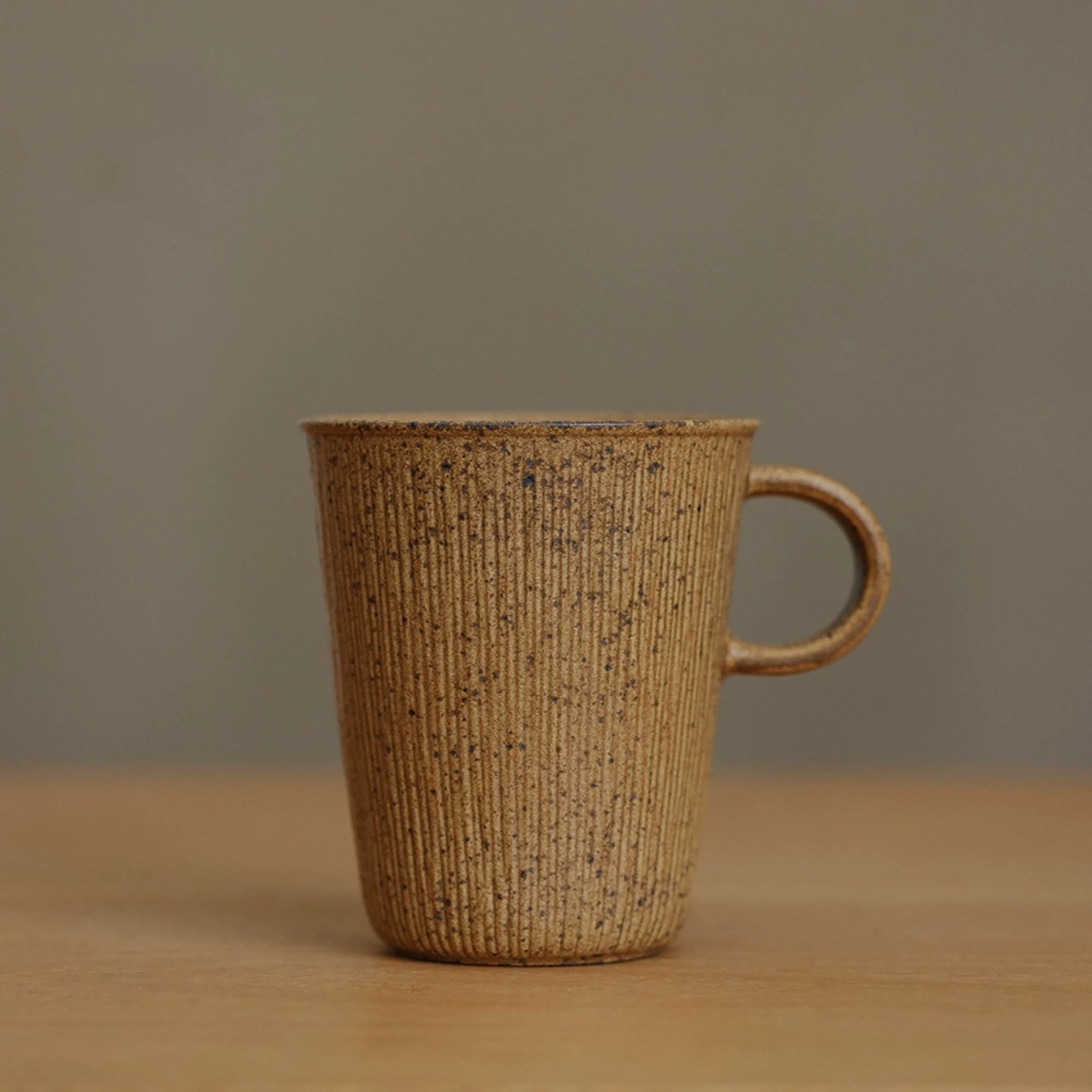 Mug en céramique à glaçure changeante effet four