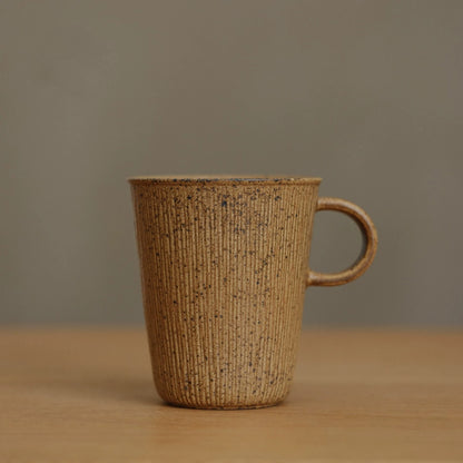 Mug en céramique à glaçure changeante effet four