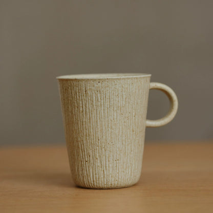 Mug en céramique à glaçure changeante effet four