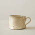 Mug artisanal avec texture toile style wabi-sabi