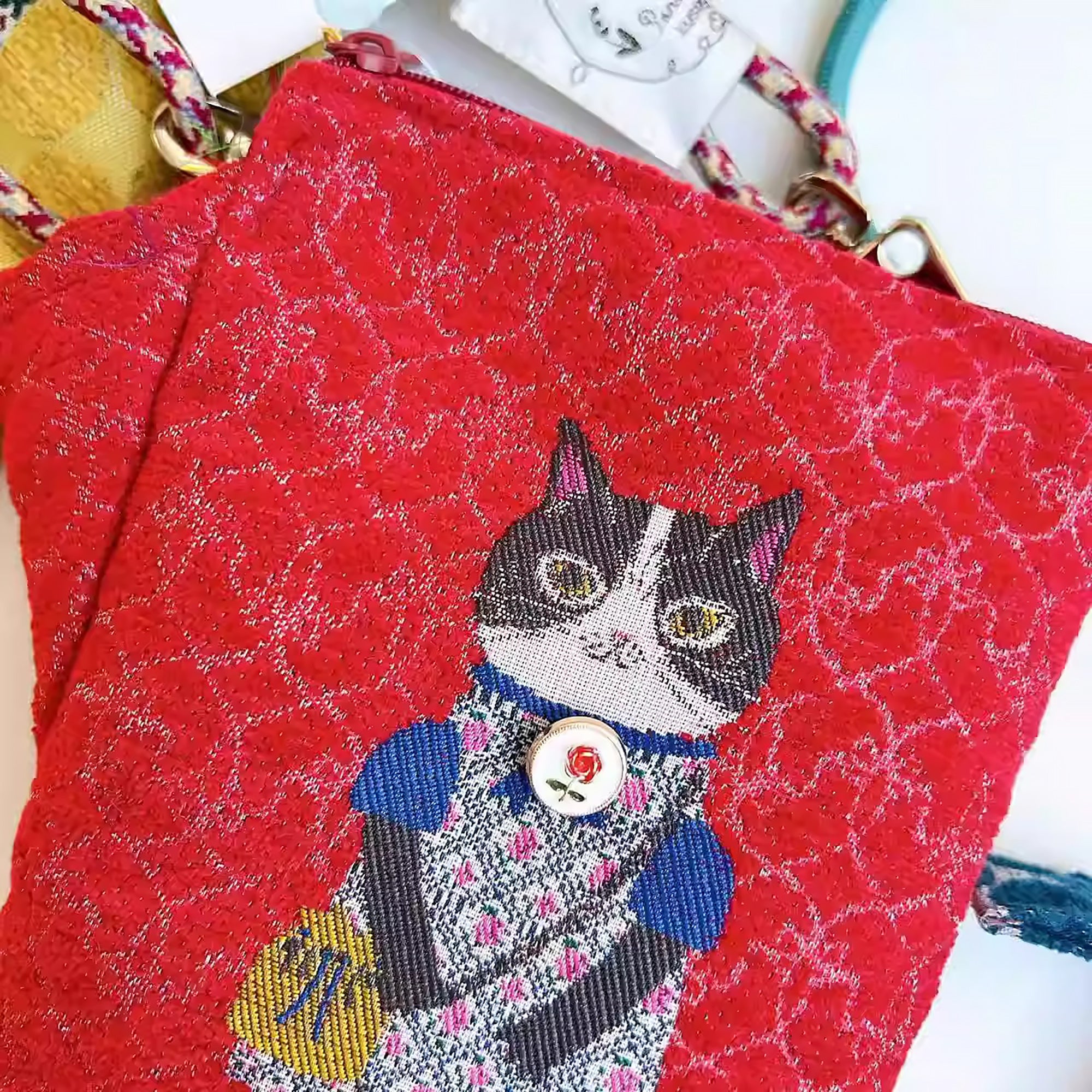 Sac bandoulière Kusuguru en jacquard avec motif chat brodé