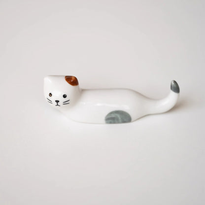 Repose-baguettes en forme de chat allongé