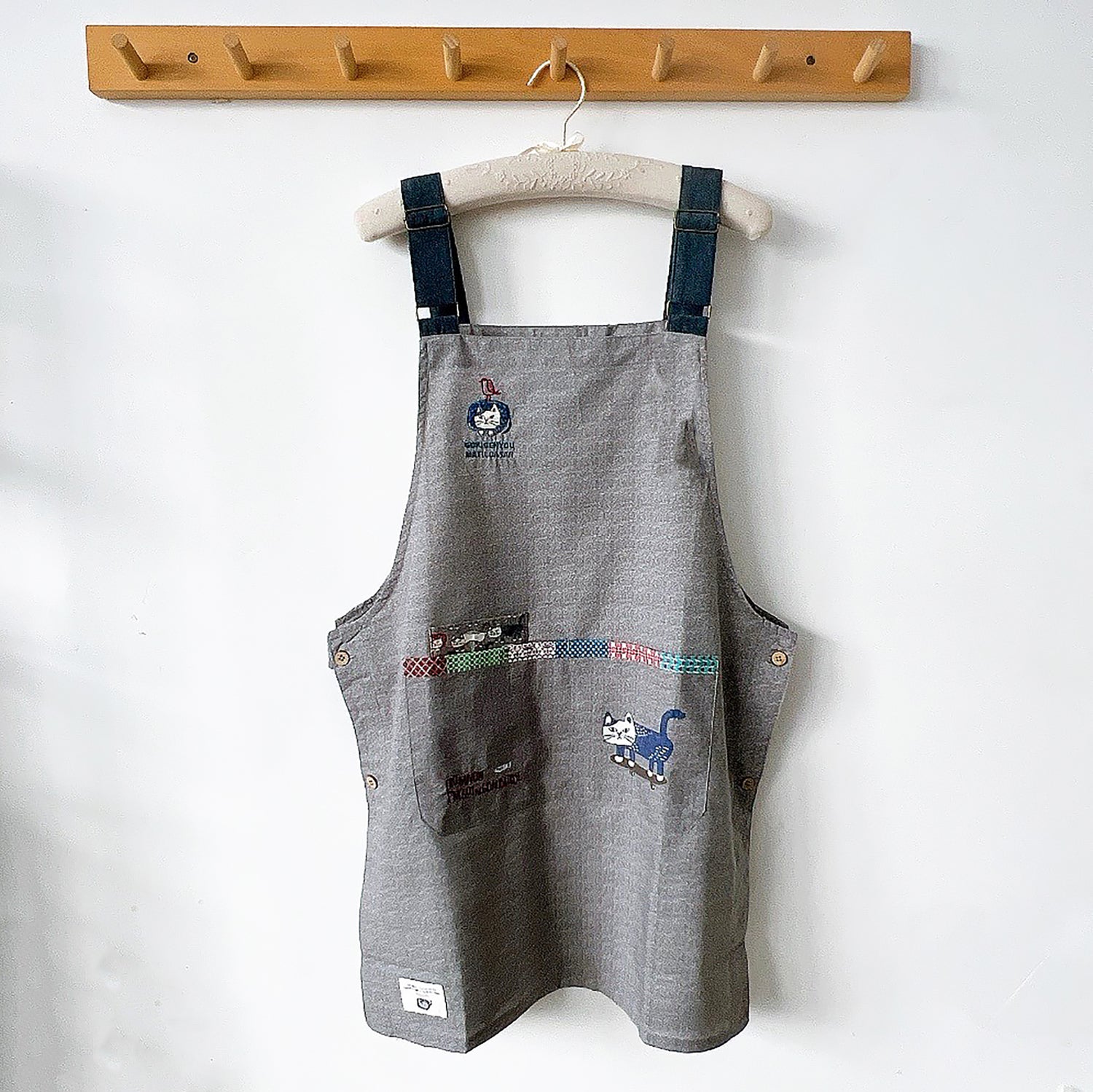 Tablier Kusuguru réversible avec motif chat