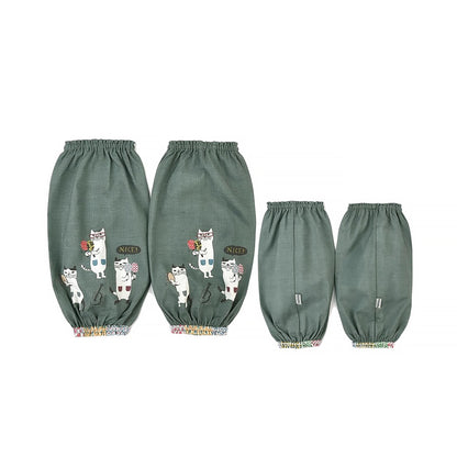 Tablier et manchette Kusuguru avec motif chat brodé