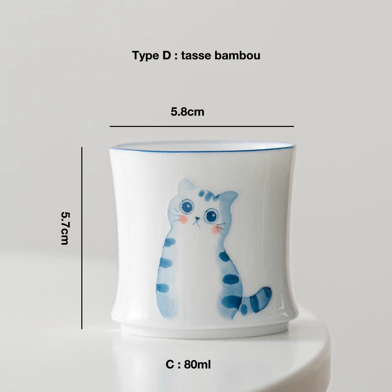 Tasses en porcelaine blanche avec motif de chat mignon