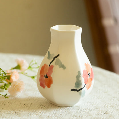 Vase en porcelaine avec décor floral peint à la main