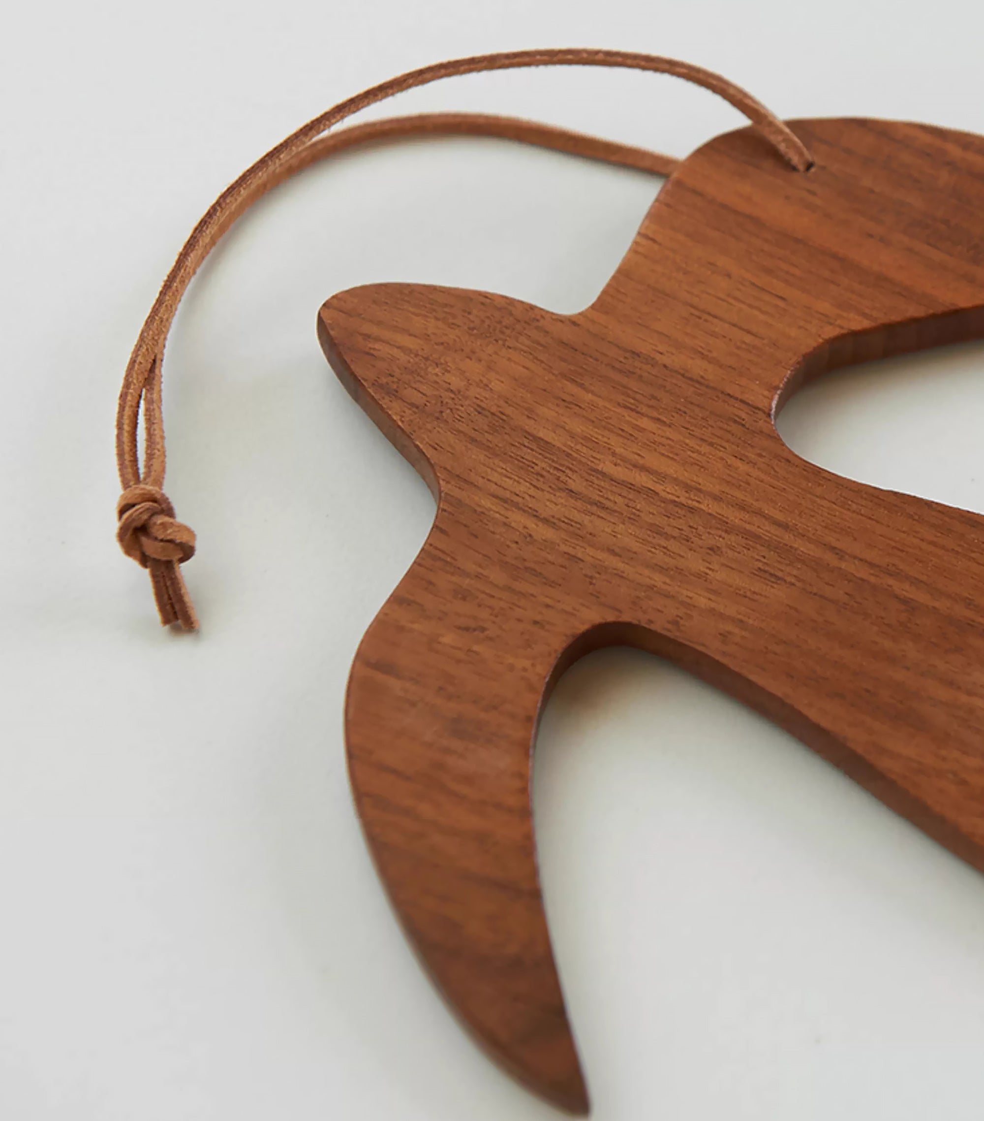 Sous-verre en bois de noyer forme hirondelle