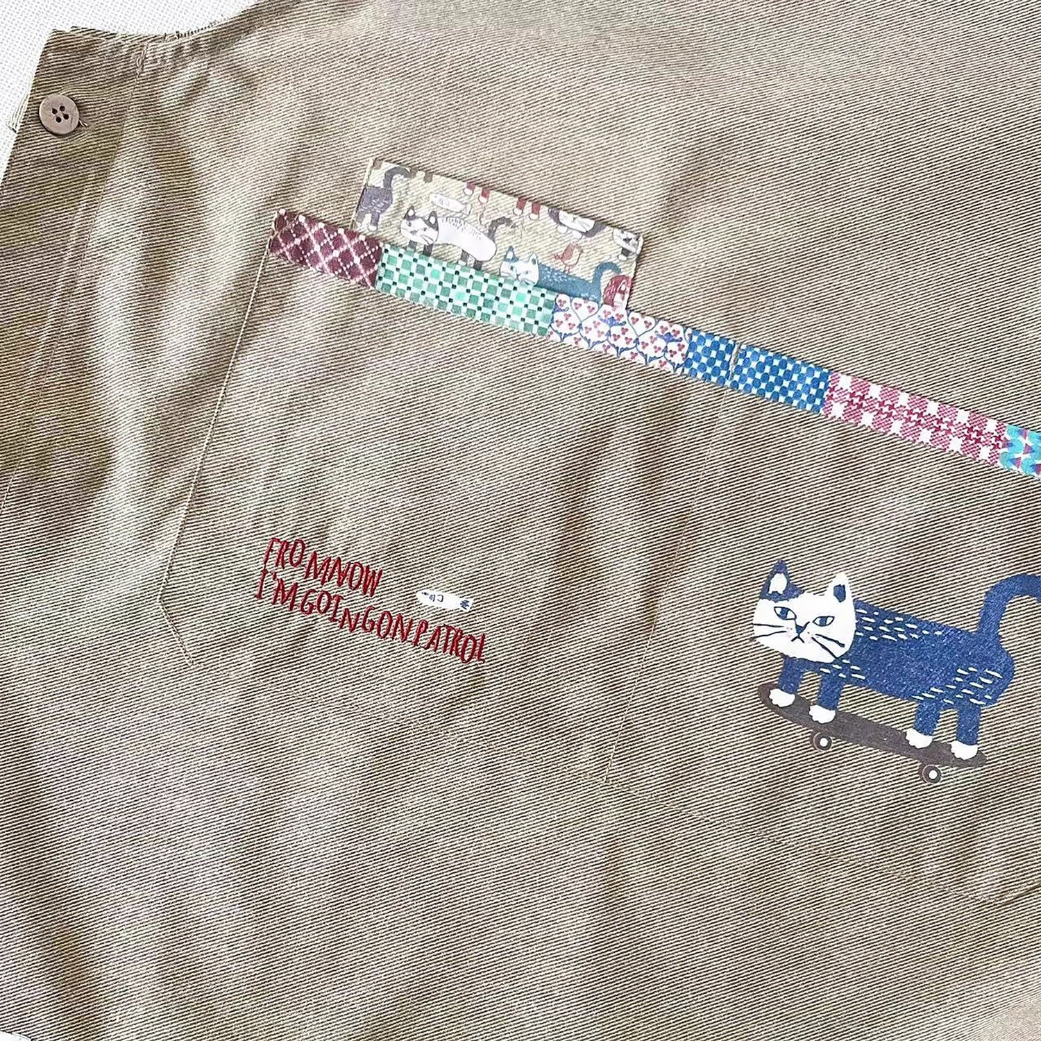 Tablier Kusuguru réversible avec motif chat