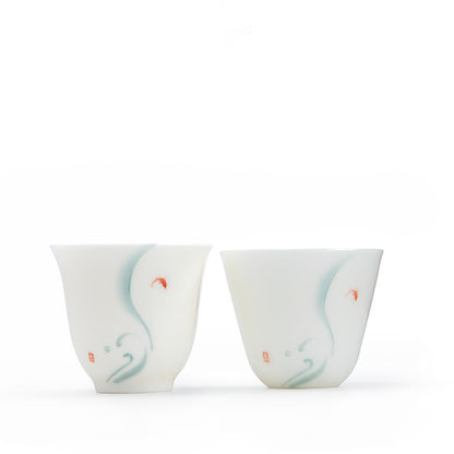 Tasses du thé en porcelaine avec design bonheur de poisson