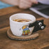 Tasse à café artisanale avec anse chat en relief
