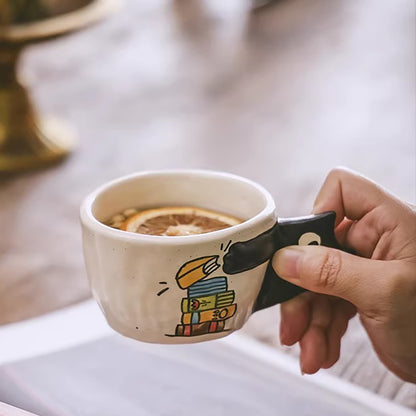 Tasse à café artisanale avec anse chat en relief