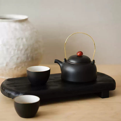 Tasse à thé en grès noir mat 