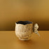 Tasse à thé motif pierre avec anse papillon
