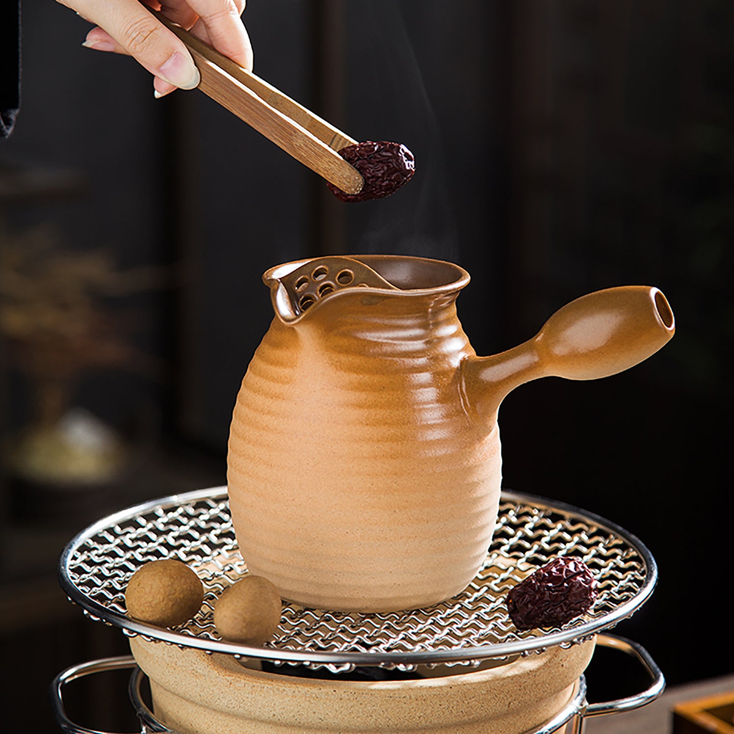 Réchaud à thé artisanal en terre cuite