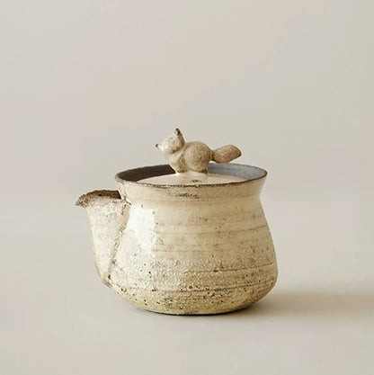 Théière artisanale style wabi-sabi avec finition Kohiki
