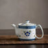 Théière en porcelaine Mino-yaki Issei Tōen décor fleurs bleues