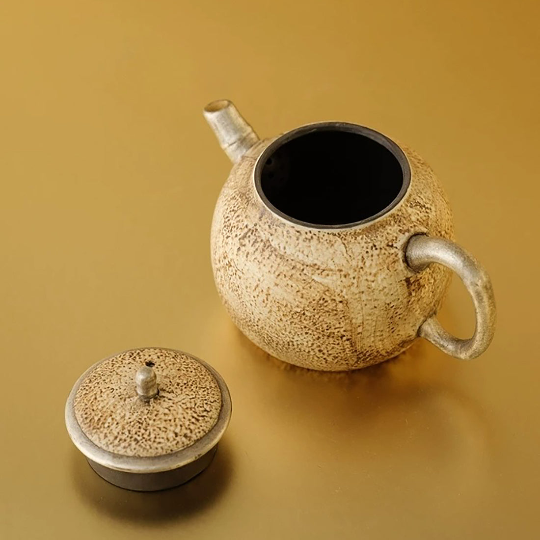 Théière Kohiki effet pierre avec anse forme bambou argentée