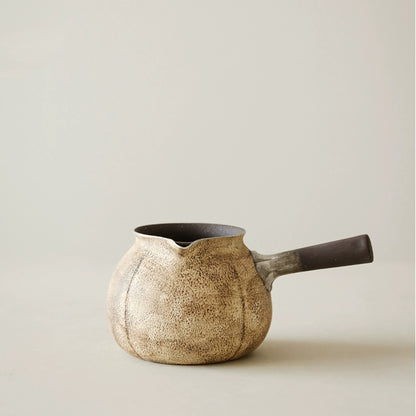 Théière latérale en céramique effet pierre finition argentée