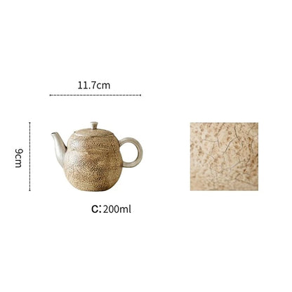 Théière artisanale en argile forme gourde avec anse argentée