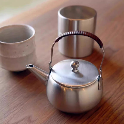 Théière Orient Modern rétro en inox avec anse en rotin